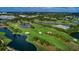 Aerial view of the golf course and surrounding area at 100 Oakmont Ln # 602, Belleair, FL 33756