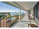 Relaxing balcony overlooking the bay and pool area at 100 Oakmont Ln # 602, Belleair, FL 33756