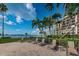 Relaxing patio area with lounge chairs and waterfront views at 100 Oakmont Ln # 602, Belleair, FL 33756