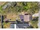 Bird's eye view of the property, showcasing the house, yard, and surroundings at 10228 Oslin St, Tampa, FL 33615