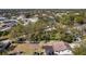 Aerial view of house, showcasing backyard and surrounding neighborhood at 10228 Oslin St, Tampa, FL 33615