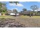 Large backyard with deck, gazebo, and shed at 10228 Oslin St, Tampa, FL 33615