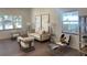 Light and airy living room featuring a beige sofa and wooden accents at 1046 Bass Blvd, Dunedin, FL 34698