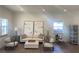 Light and airy living room featuring a beige sofa and wooden accents at 1046 Bass Blvd, Dunedin, FL 34698