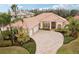 One-story home with tile roof and landscaped yard at 10553 Bermuda Isle Dr, Tampa, FL 33647