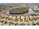 Aerial view showing home's location in a peaceful, waterfront community at 10553 Bermuda Isle Dr, Tampa, FL 33647