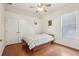 Bedroom with hardwood floors, double doors at 10553 Bermuda Isle Dr, Tampa, FL 33647