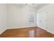 Bright bedroom with hardwood floors and double door closet at 10553 Bermuda Isle Dr, Tampa, FL 33647