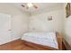 Bedroom with hardwood floors and double door closet at 10553 Bermuda Isle Dr, Tampa, FL 33647