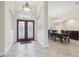 Elegant entryway with double doors and formal dining area at 10553 Bermuda Isle Dr, Tampa, FL 33647