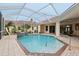 Inviting pool with covered patio at 10553 Bermuda Isle Dr, Tampa, FL 33647