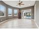 Sunroom with pool access and tile flooring at 10553 Bermuda Isle Dr, Tampa, FL 33647