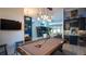 Game room with a pool table and stylish light fixture at 10745 Bardes Ct, Seminole, FL 33777