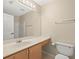 Clean bathroom with a vanity, mirror, and shower at 11013 Cranston St, Spring Hill, FL 34608