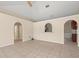 Living room with high ceilings and archways at 11013 Cranston St, Spring Hill, FL 34608