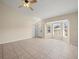 Living room with bay window and vaulted ceiling at 11013 Cranston St, Spring Hill, FL 34608