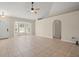 Open living area with high ceilings and tile flooring at 11013 Cranston St, Spring Hill, FL 34608