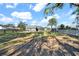 Large backyard with shed and spacious grassy area at 11201 Lake Sassa Dr, Thonotosassa, FL 33592