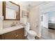 Updated bathroom with a vanity, toilet and shower at 11201 Lake Sassa Dr, Thonotosassa, FL 33592