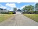 Detached garage with a long driveway at 11201 Lake Sassa Dr, Thonotosassa, FL 33592