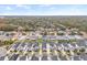 Aerial view of house and surrounding neighborhood at 11220 Moultrie Pl, Tampa, FL 33625