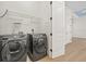 Laundry room with Samsung washer and dryer at 11220 Moultrie Pl, Tampa, FL 33625