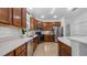 Spacious kitchen featuring wooden cabinets, white subway tile backsplash, stainless steel appliances at 11540 Balintore Dr, Riverview, FL 33579