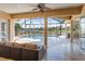 Relaxing screened-in pool area with outdoor seating at 11919 Royce Waterford Cir, Tampa, FL 33626