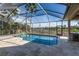 Relaxing screened-in pool with water views at 11919 Royce Waterford Cir, Tampa, FL 33626