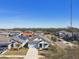 Aerial view of a house in a residential neighborhood with solar panels at 12119 Creek Preserve Dr, Riverview, FL 33579