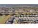 Wide aerial view of suburban neighborhood with houses and roads at 12119 Creek Preserve Dr, Riverview, FL 33579