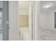 Clean bathroom with a tub/shower combo and beige tile at 12119 Creek Preserve Dr, Riverview, FL 33579