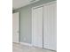 White closet doors in bedroom with light grey walls at 12119 Creek Preserve Dr, Riverview, FL 33579