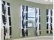 Bedroom with sage green walls and black and white curtains at 12119 Creek Preserve Dr, Riverview, FL 33579