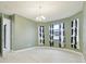 Spacious bedroom with light green walls and chandelier at 12119 Creek Preserve Dr, Riverview, FL 33579