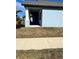 Side view of a light blue single-story house with a covered porch area at 12119 Creek Preserve Dr, Riverview, FL 33579