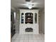 White china cabinet with glass doors and wine rack at 12264 103Rd St, Largo, FL 33773