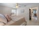 Comfortable bedroom with a queen-size bed and built-in closet at 13472 Bellewood Ave, Seminole, FL 33776