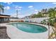 Expansive kidney-shaped pool and patio area at 13472 Bellewood Ave, Seminole, FL 33776