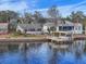 Waterfront property with private dock and boat lift, offering serene water views at 17 Venetian Ct, Tarpon Springs, FL 34689