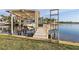 Private boat lift and dock perfect for enjoying water activities at 17 Venetian Ct, Tarpon Springs, FL 34689