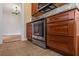 Stainless steel appliances and wood cabinets in kitchen at 17 Venetian Ct, Tarpon Springs, FL 34689