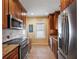 Eat-in kitchen with stainless steel appliances at 17 Venetian Ct, Tarpon Springs, FL 34689