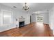 Living room features hardwood floors and fireplace at 17 Venetian Ct, Tarpon Springs, FL 34689