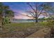 Stunning sunset view over the peaceful waterfront at 17 Venetian Ct, Tarpon Springs, FL 34689