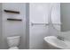 Simple bathroom with white vanity and toilet at 17533 Stinchar Dr, Land O Lakes, FL 34638