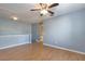 Spacious bedroom with hardwood floors and ceiling fan at 17533 Stinchar Dr, Land O Lakes, FL 34638