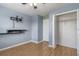 Bedroom with wood floors, closet, and mounted TV at 17533 Stinchar Dr, Land O Lakes, FL 34638