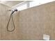 Large tiled shower with handheld shower head at 18420 Burrell Rd, Odessa, FL 33556