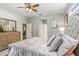 Serene main bedroom with neutral tones and ensuite bath access at 2005 Wexford Green Dr, Valrico, FL 33594